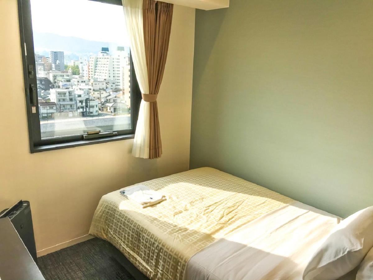 Hotel Livemax Hiroshima Funairimachi Riverside Bagian luar foto